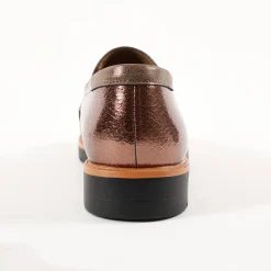 Slip-ons met sleehak, franjes en kwastjes
