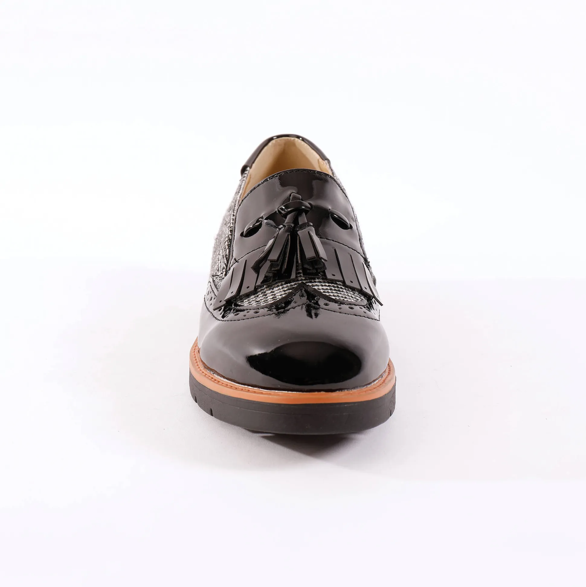 Slip-ons met sleehak, franjes en pompons - geruit/grijs