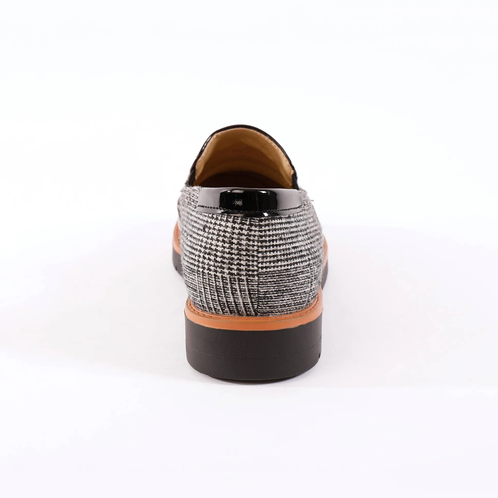 Slip-ons met sleehak, franjes en pompons - geruit/grijs