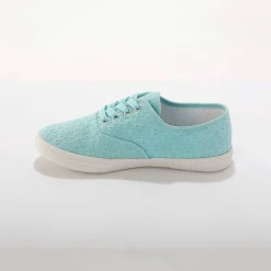 Sneakers in geborduurd canvas