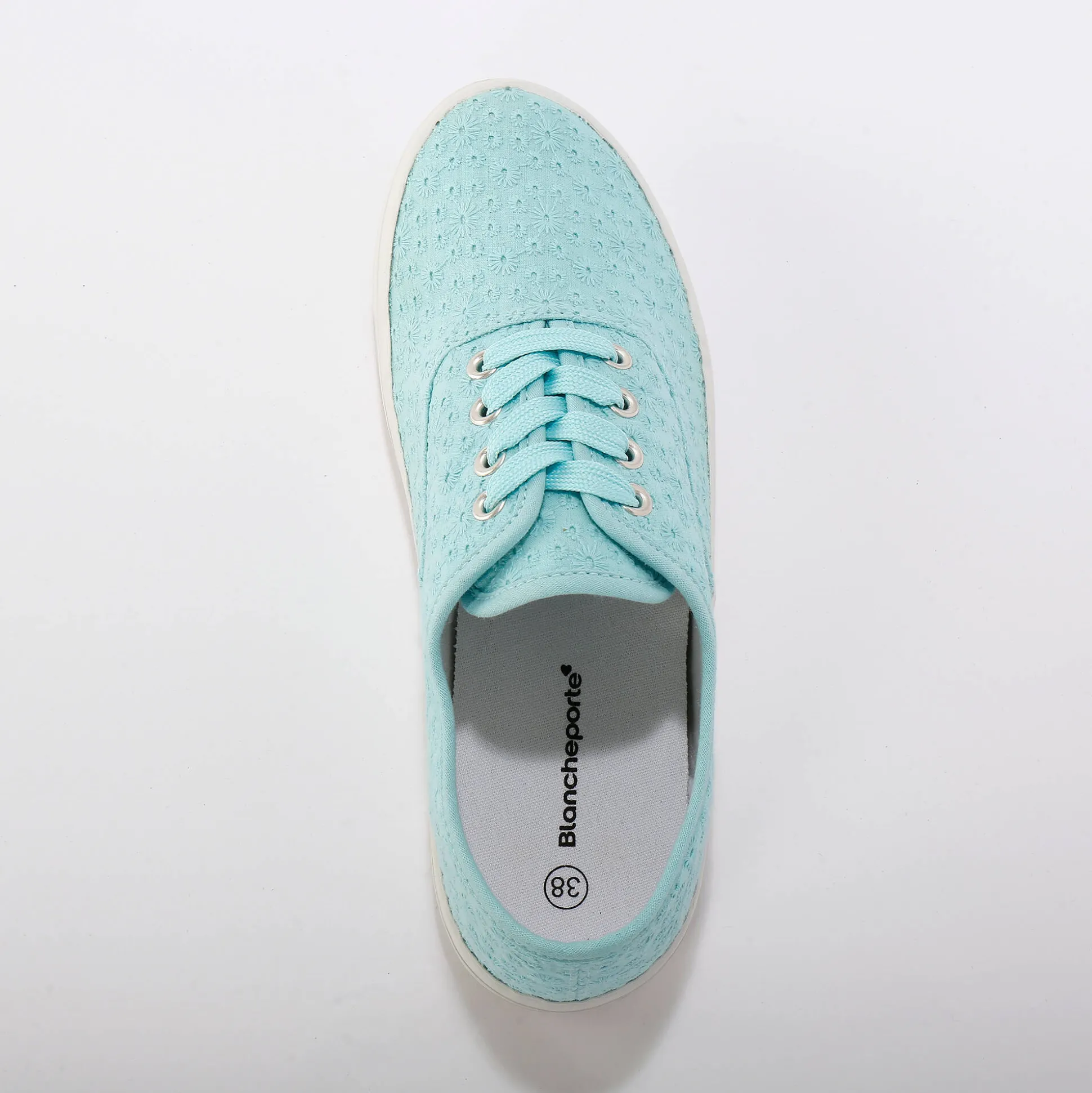 Sneakers in geborduurd canvas