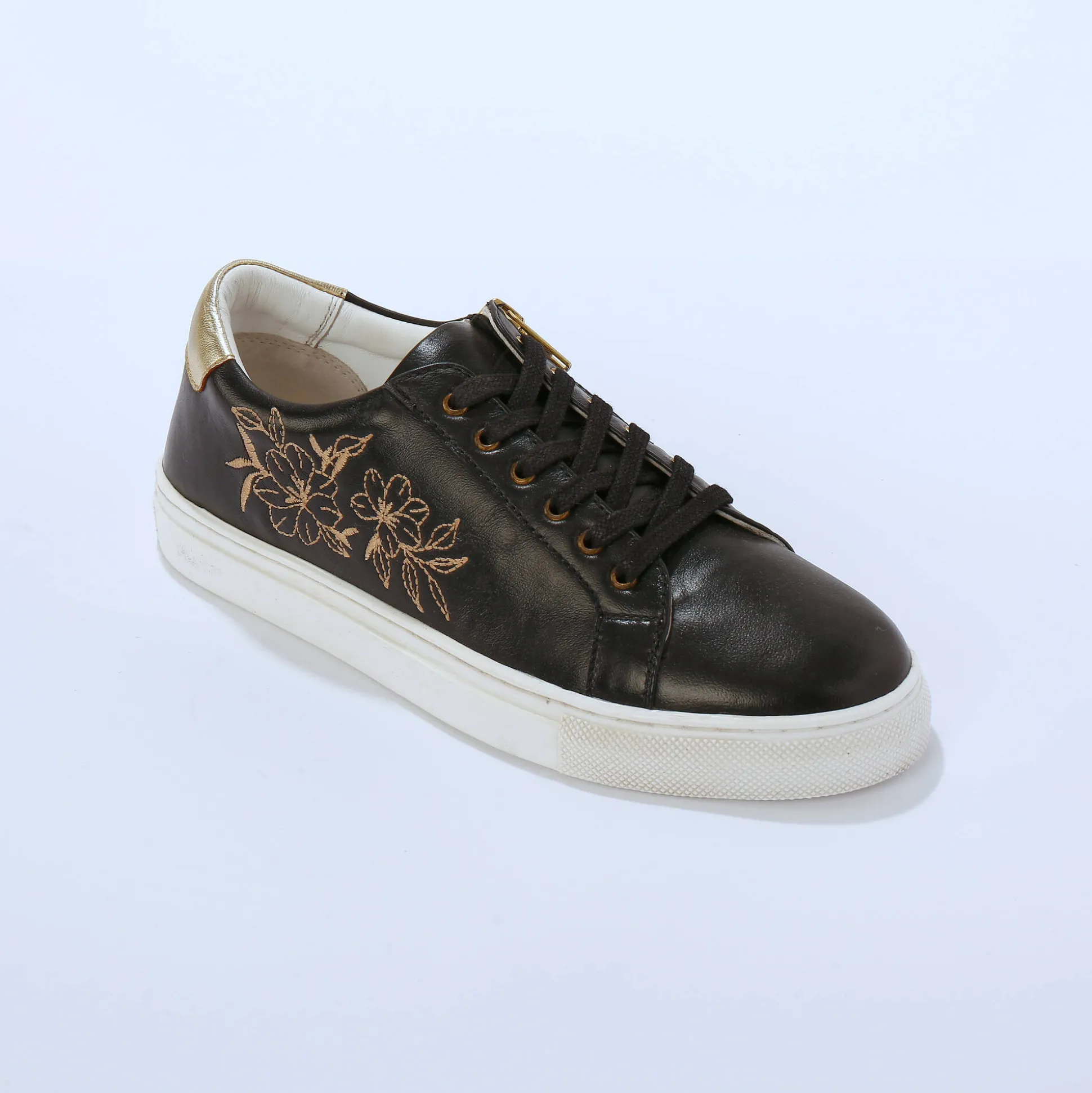Sneakers met borduursel en rits