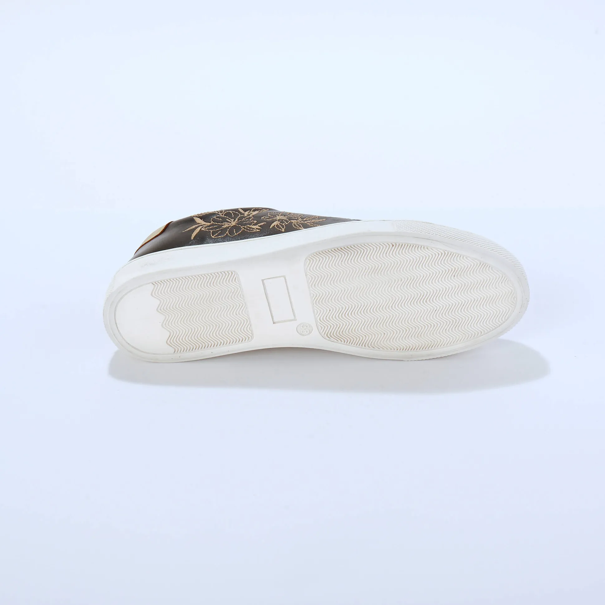 Sneakers met borduursel en rits