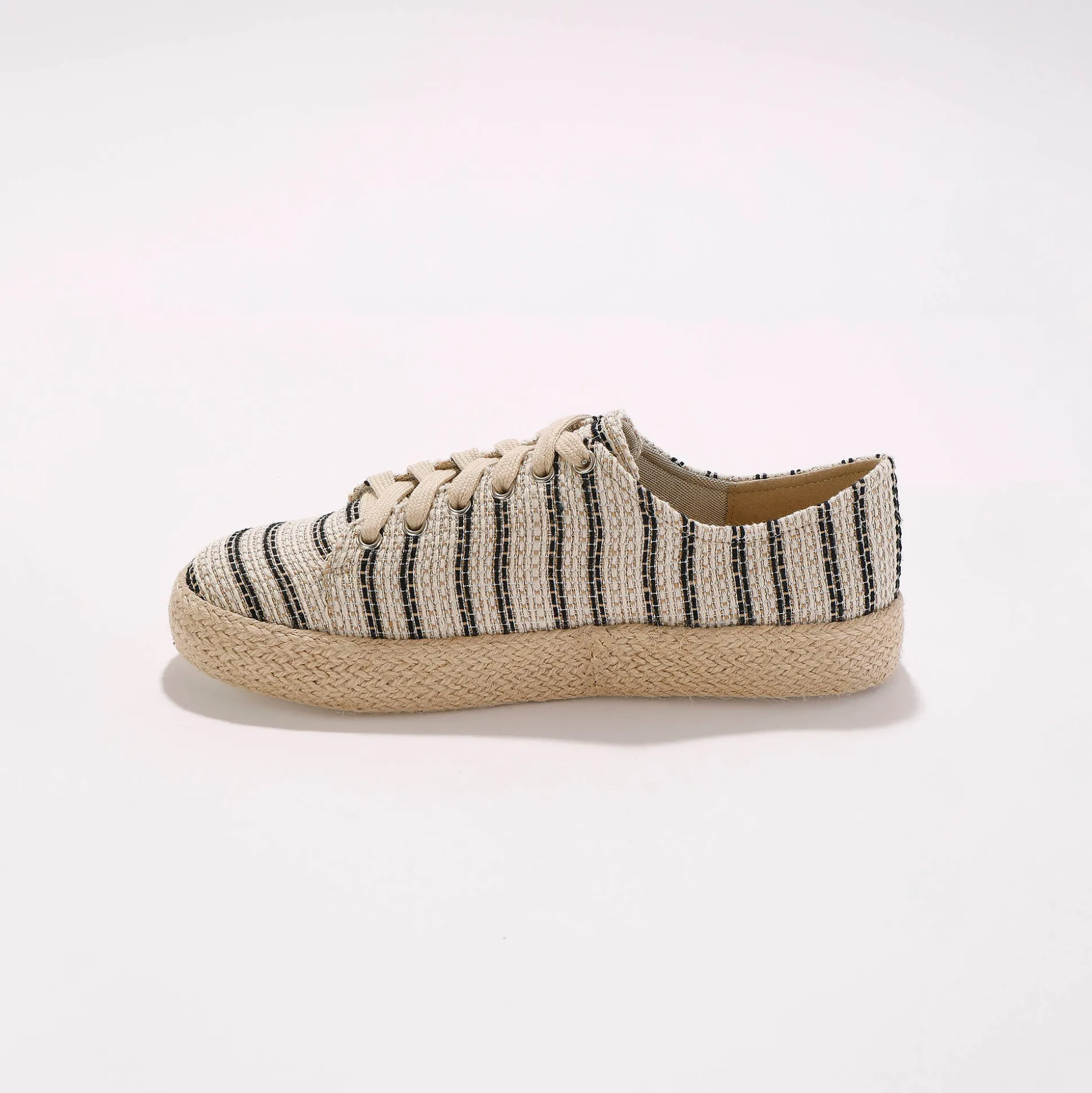 Sneakers met sleehak en koordzool