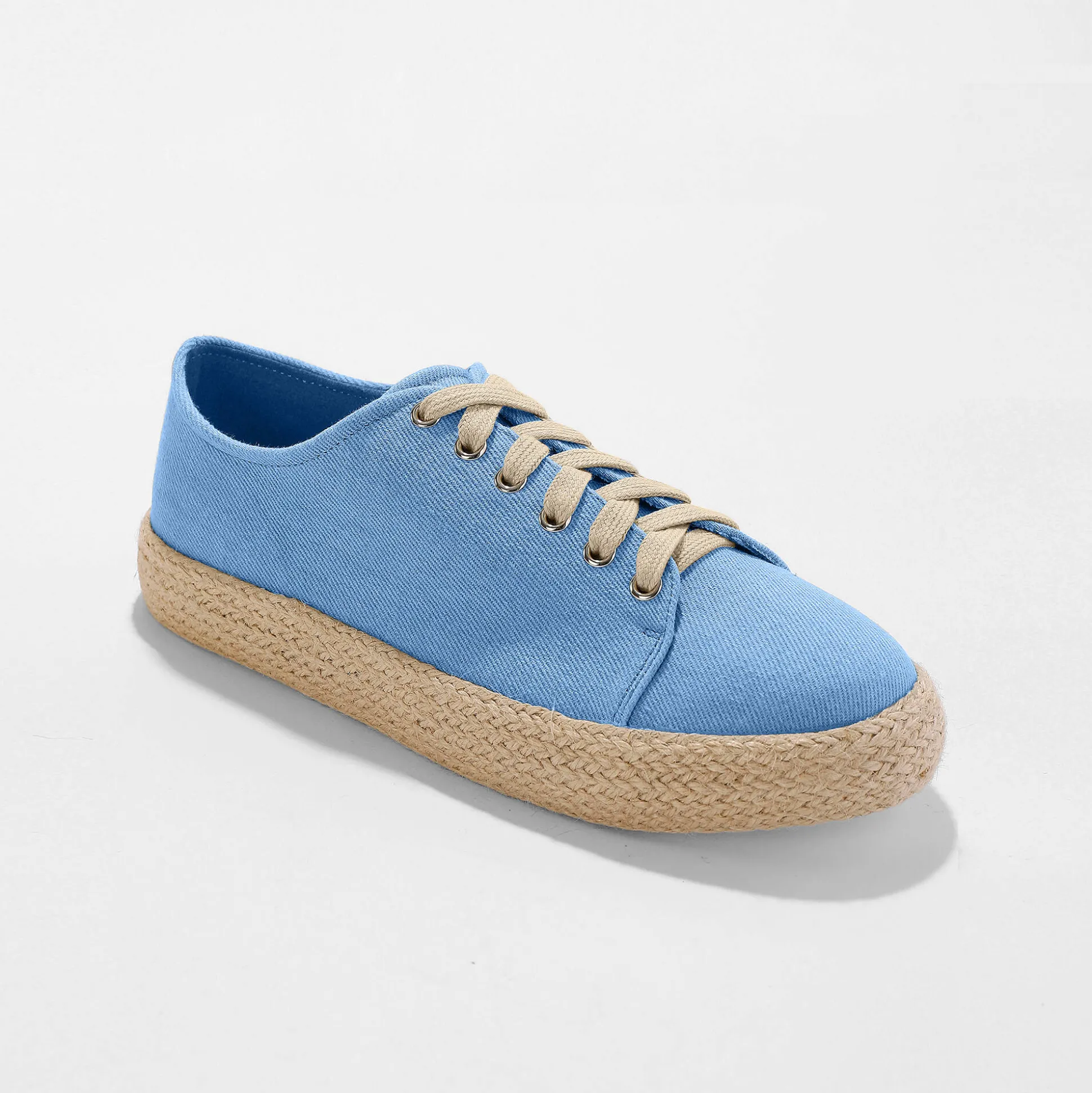 Sneakers met sleehak en koordzool