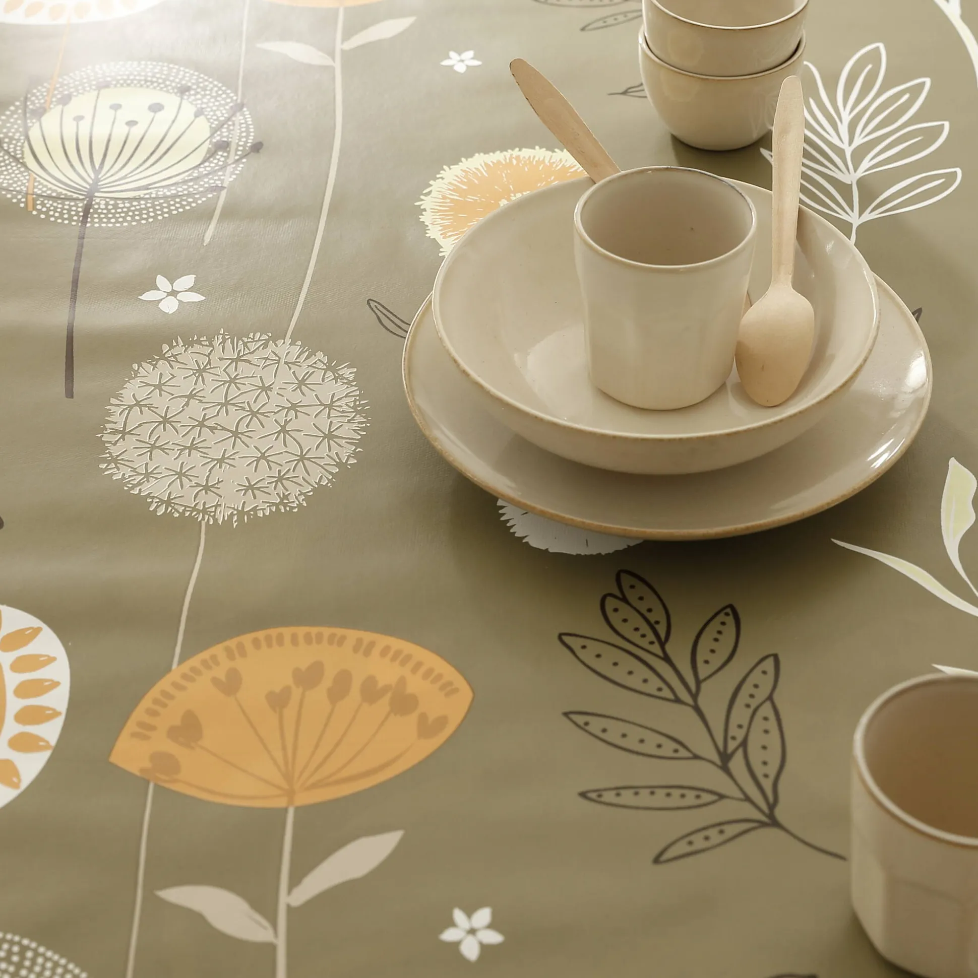 Tafellaken in toile cirée met paardenbloemmotief