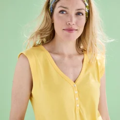Topje met V-hals, detail in broderie anglaise op de rug