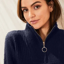 Trui in ribtricot met ritskraag