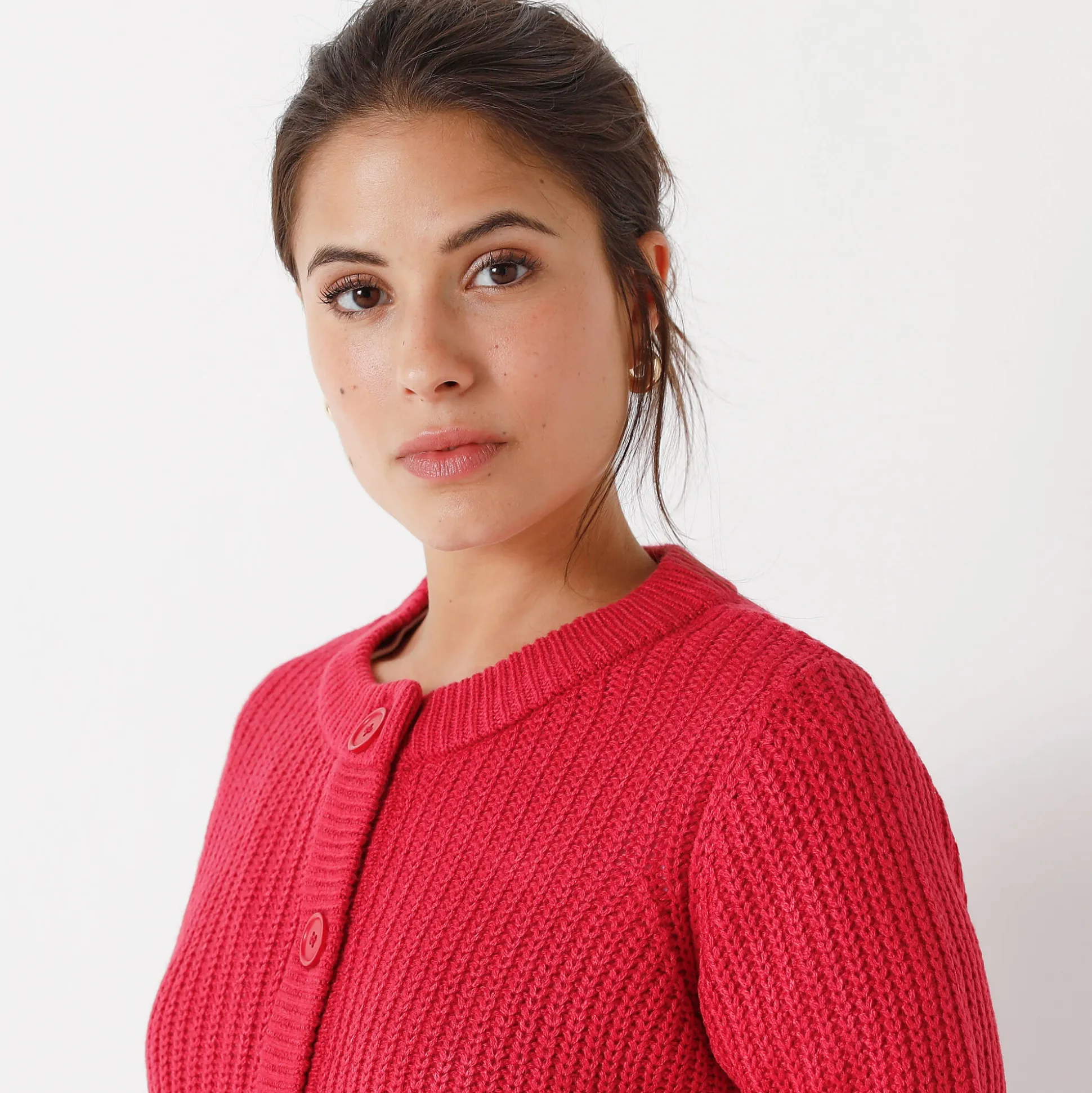 Vest met knopen in patenttricot