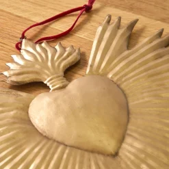 Wanddecoratie ex voto, goudkleurig metaal