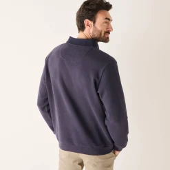 Warme sweater met polokraag, borduursel op de borst, in ribtricot