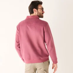 Warme sweater met polokraag, borduursel op de borst, in ribtricot