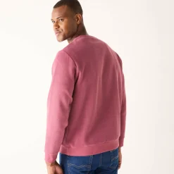 Warme sweater met ronde hals, borduursel op de borst, in ribtricot